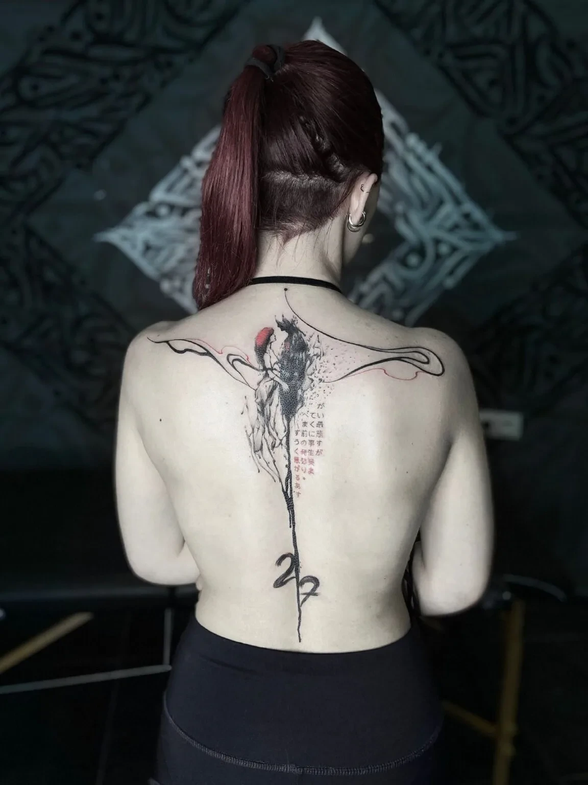 TKTX Spine Tattoo